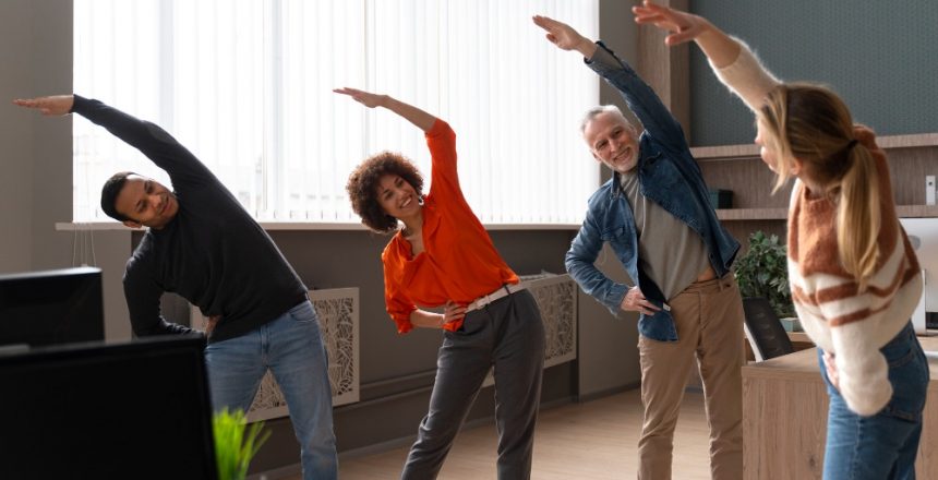 small business owners joining together in a group yoga and movement session